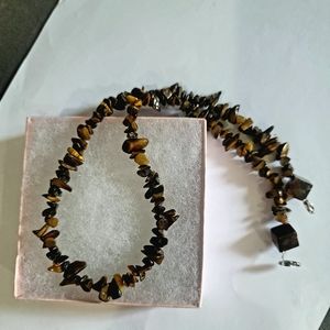 RARE TIGER EYE  BEADS CREATE THIS GORGEOUS STRAND OF BEADS TO ACCENT AND COMPLIM